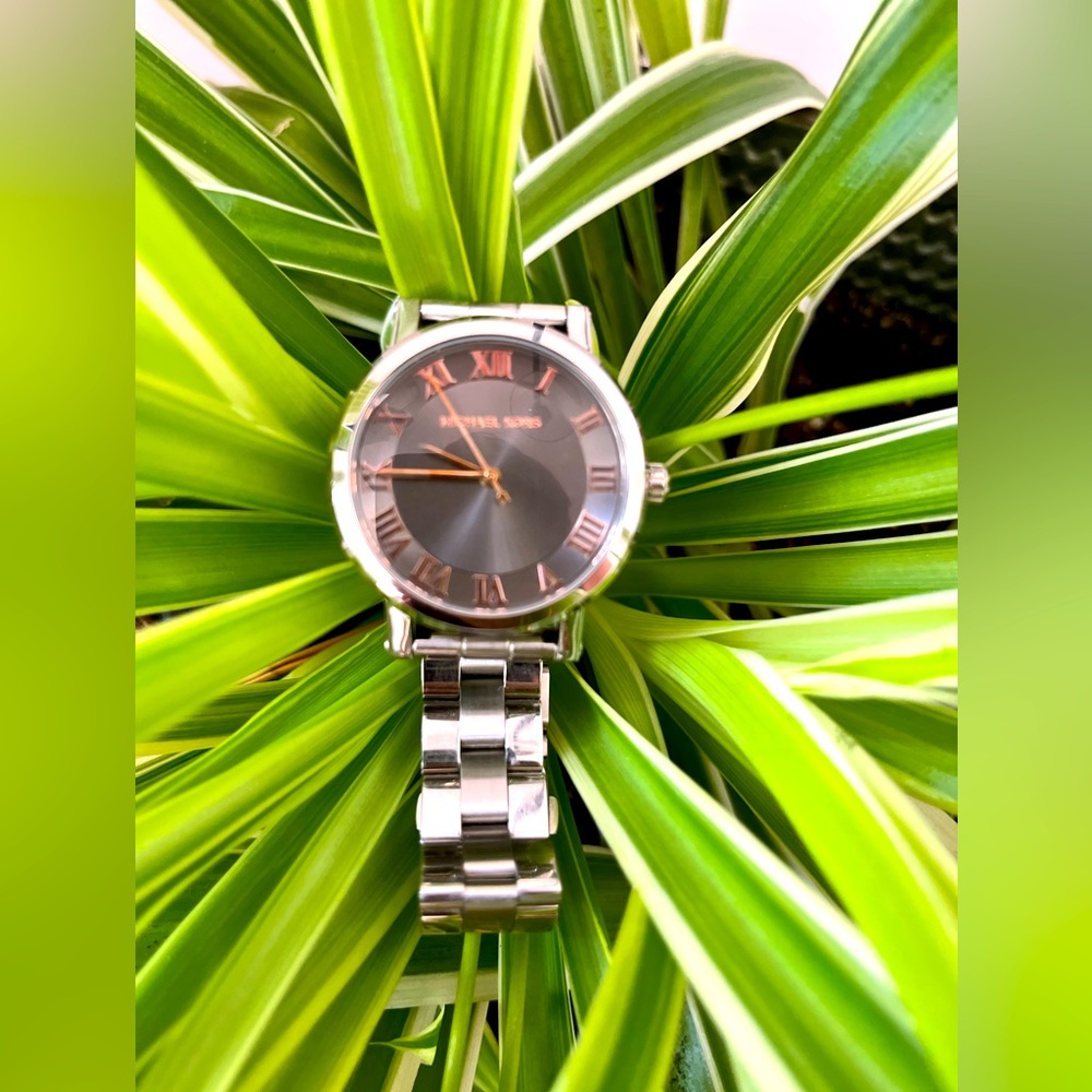 Silver and rose golden Micheal Kors watch